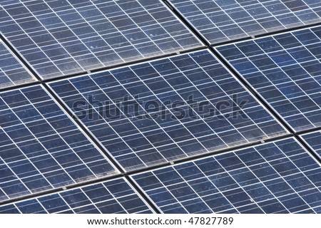 Texture detail of photoelectric cells of a solar panel (Blue and ecology energy)