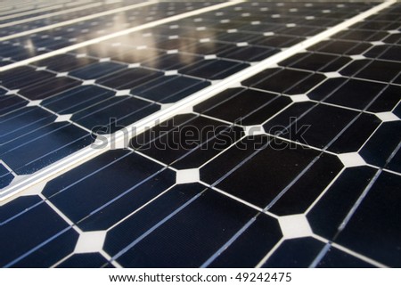 Texture detail of photoelectric cells of a solar panel (Blue and ecology energy)