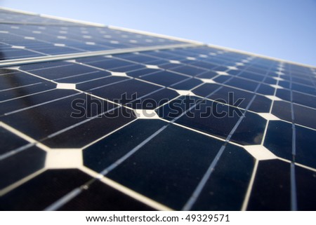 Texture detail of photoelectric cells of a solar panel (Blue and ecology energy) - photographed with shallow DOF