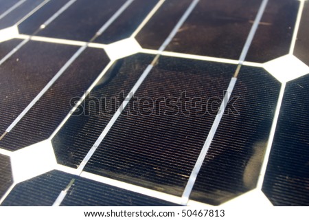 Closeup texture photoelectric cells from a solar panel (Blue and ecology energy)