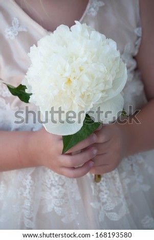 Flower girl  holding flower