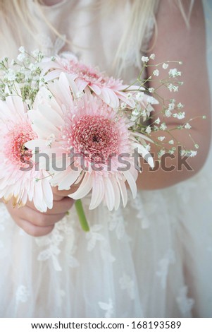 Flower girl  holding flower