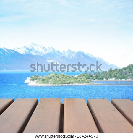 wood terrace on the beach and sun light