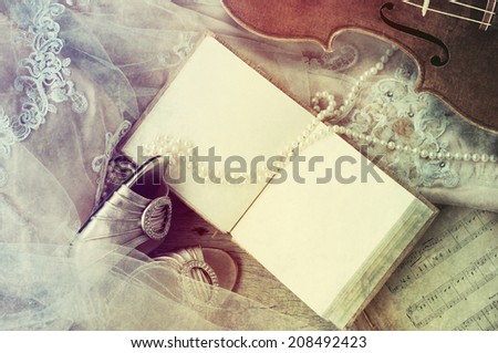 Guest book with wedding dress, shoes, pearl