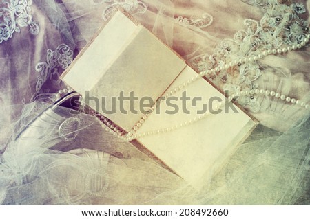 Guest book with wedding dress, shoes, pearl