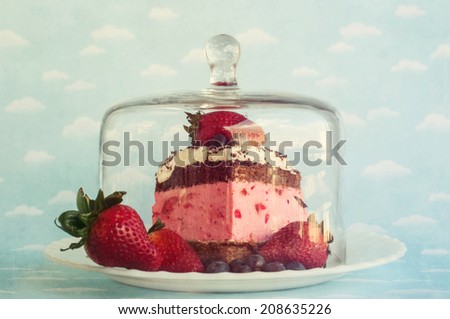 Cake in a glass bell jar