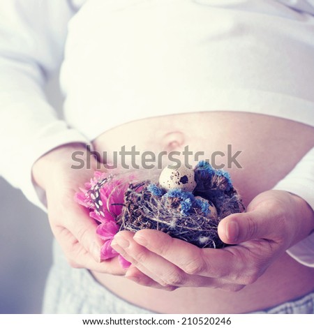 Pregnant woman with nest