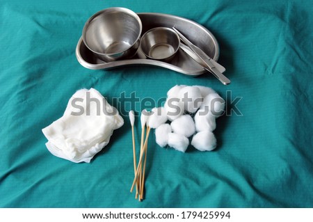 set of dressing often used supplies in a medical for cleaning wounds,on white background