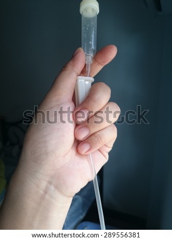 Close up of a drip infusion set