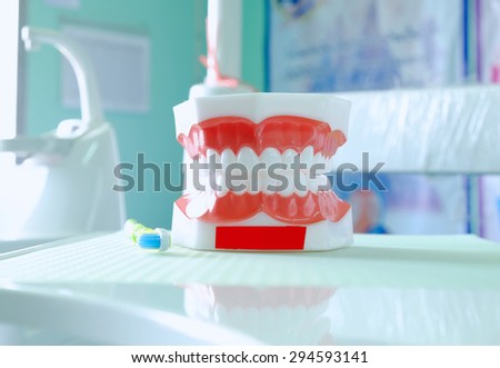 Dental model on dentistry office background