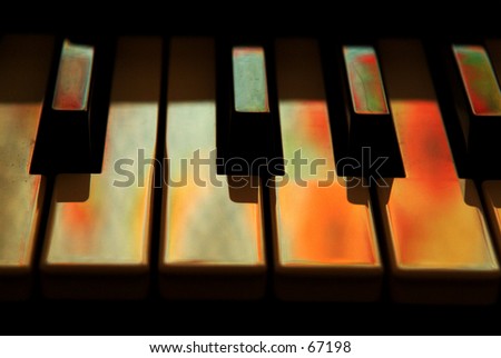A face-lift for an old keyboard. The colors were from reflections of lights through the curtains.
