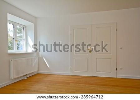 Living room in an old building - Apartment with parquet, wooden floors after renovation