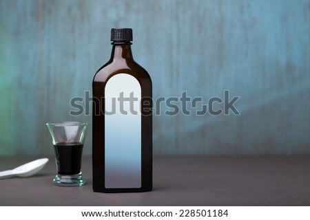 bottle; glass; spoon; syrup; natural; health; cure; disease; cough; allergy; oil; wood; herb; infusion; cold; chill;