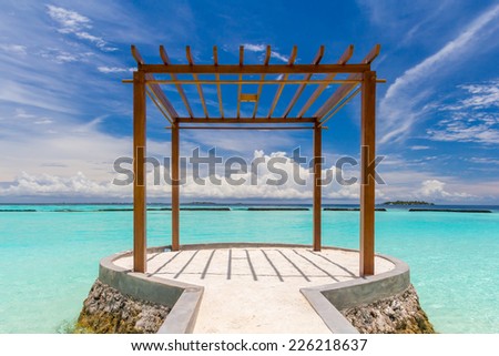 Wooden pavilion at Maldives in front of Indian ocean
