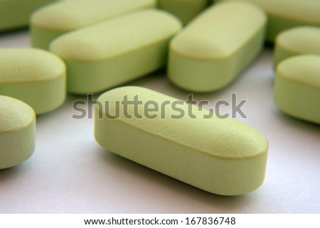 A handful of green pills