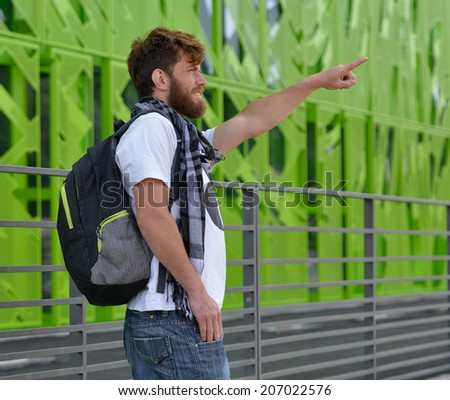 young tourist man with backpack
