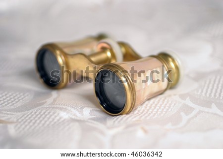 Antique binoculars to look at opera and plays.