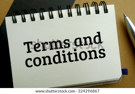 Terms and conditions memo written on a notebook with pen