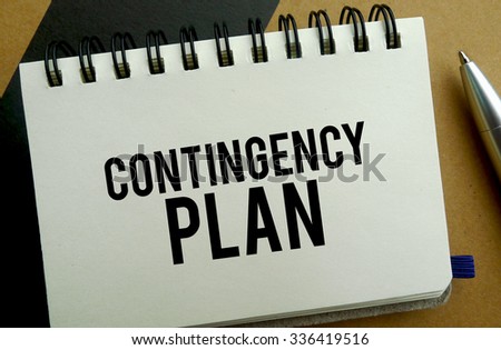 Contingency plan memo written on a notebook with pen