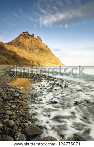 beautiful summer seascape with mountain and waves, natural background