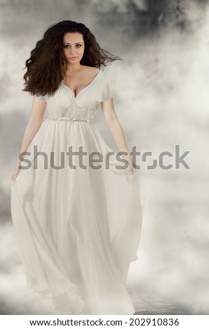 Beautiful woman in white dress. Fantasy woman. Book cover