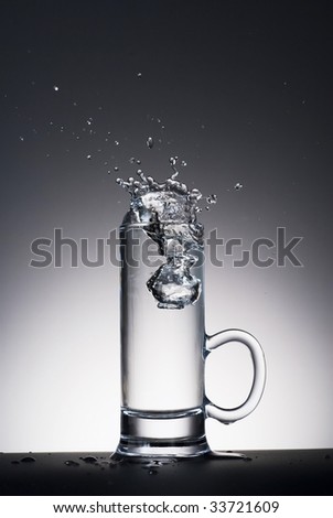 water splash in vodka glass