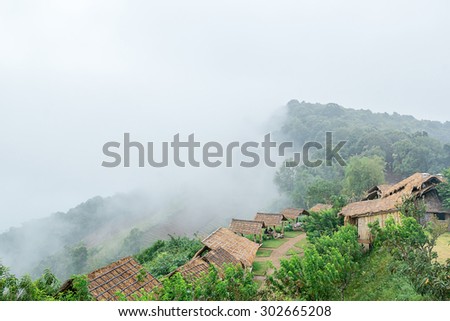 Cottage in mountain with fog