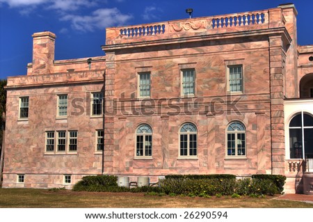 North wing of Charles & Edith Ringling's winter retreat, showing beautiful color of marble construction.  This building now houses administrative offices for New College of Florida