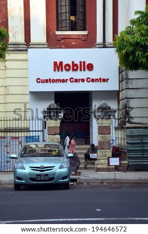 YANGON, MYANMAR, APRIL 6, 2014: Mobile customer care center in Yangon, Myanmar
