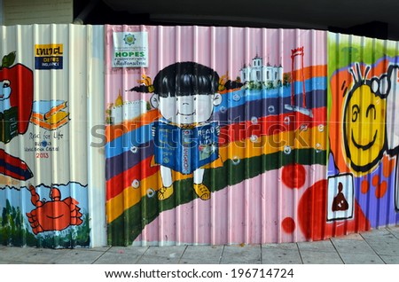 BANGKOK,THAILAND, MARCH 23, 2014: Read for life - graffiti on the fence in Bangkok, Thailand