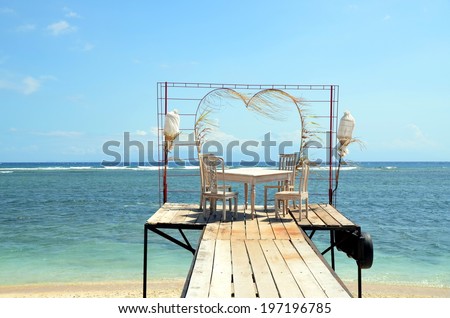 Table for lovers over the ocean. The island of Gili Trawangan, Indonesia
