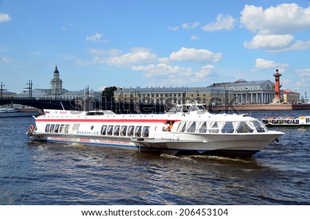 SAINT-PETERSBURG, RUSSIA, JULY 20, 2014:  Excursion boats on the Neva river  St. Petersburg, Russia