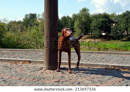 VOLOGDA, RUSSIA, AUGUST 16, 2014:  Monument to the first electric lamp post in the city of Vologda. Townspeople call it monument to pissing dog