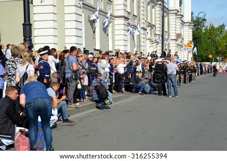 SAINT-PETERSBURG, RUSSIA, SEPTEMBER 1, 2015 - 1 September 2015. Parents of young students on the solemn line. Nakhimov Naval School, St. Petersburg