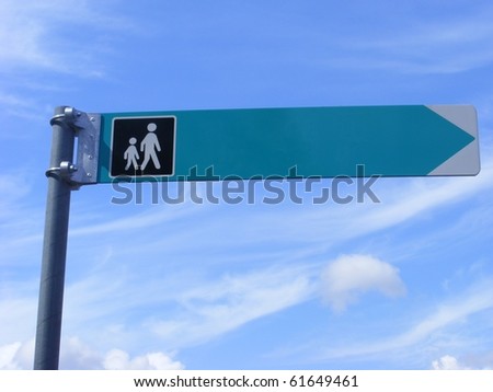 Photo of a blank directional sign with the text removed
