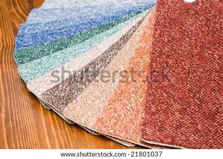 color samples of carpet laying on the table