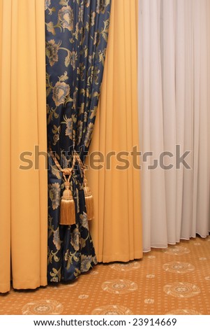 dark blue curtain with tassel, gold blackout curtain