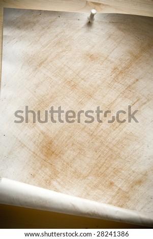 old sheet of paper on the wall can serve as grunge background