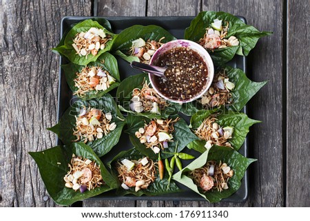 Food wrapped in leaves,A nutritious snack in Thailand .miang kham recipe thai