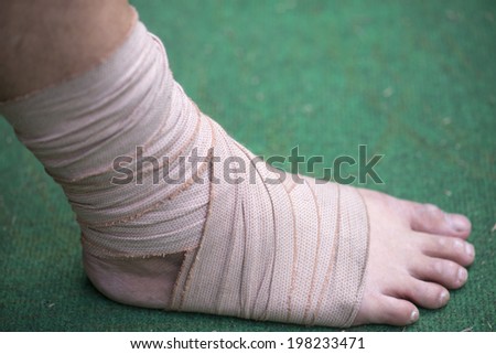 Support for ankle injury on a sport field