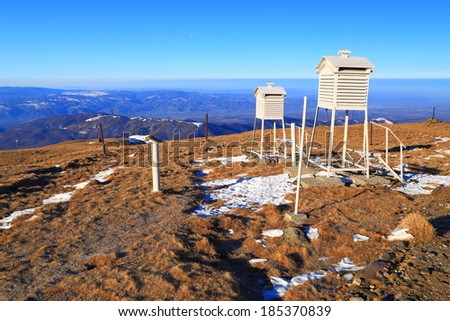 Weather measure instruments sheltered into wood boxes on the mountain