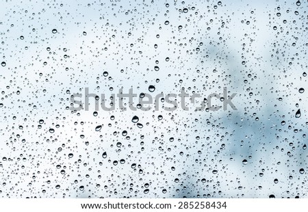 Drops of rain on a window glass. background