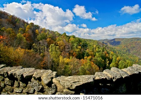 Beautiful autumn view from top of mountain of the peak of the fall leaf change over.
