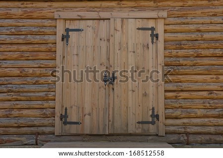 Wooden blockhouse with the door closed