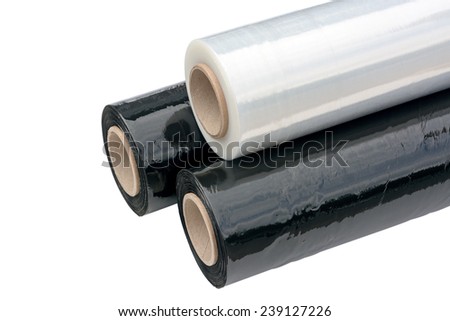 Three rolls of stretch film packaging black and transparent Wrapping film Isolated on white background Three rolls of stretch film packaging black and transparent Wrapping film Isolated on white background