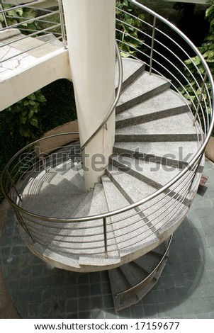 Modern outdoor spiral stair way in tropical area