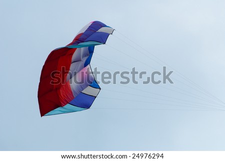 giant bed like kite in flying action