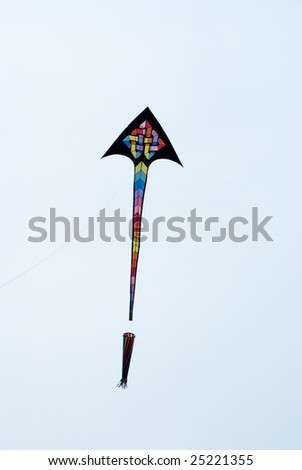 Flying kite in action in the blue sky