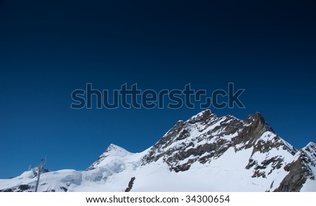 Summit of snow mountain in Switzerland in summer
