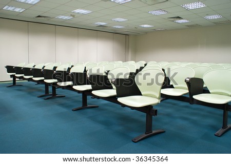 Modern light green Seat arrangement in University lecture room